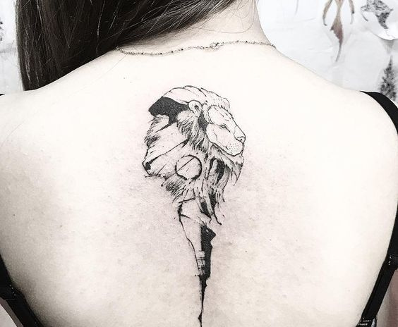   א"rock-solid" lion tattoo on the back by @herno.k 